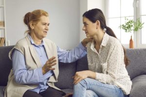 woman talking to family member with addiction