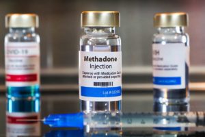 a bottle of methadone represents methadone for addiction treatment